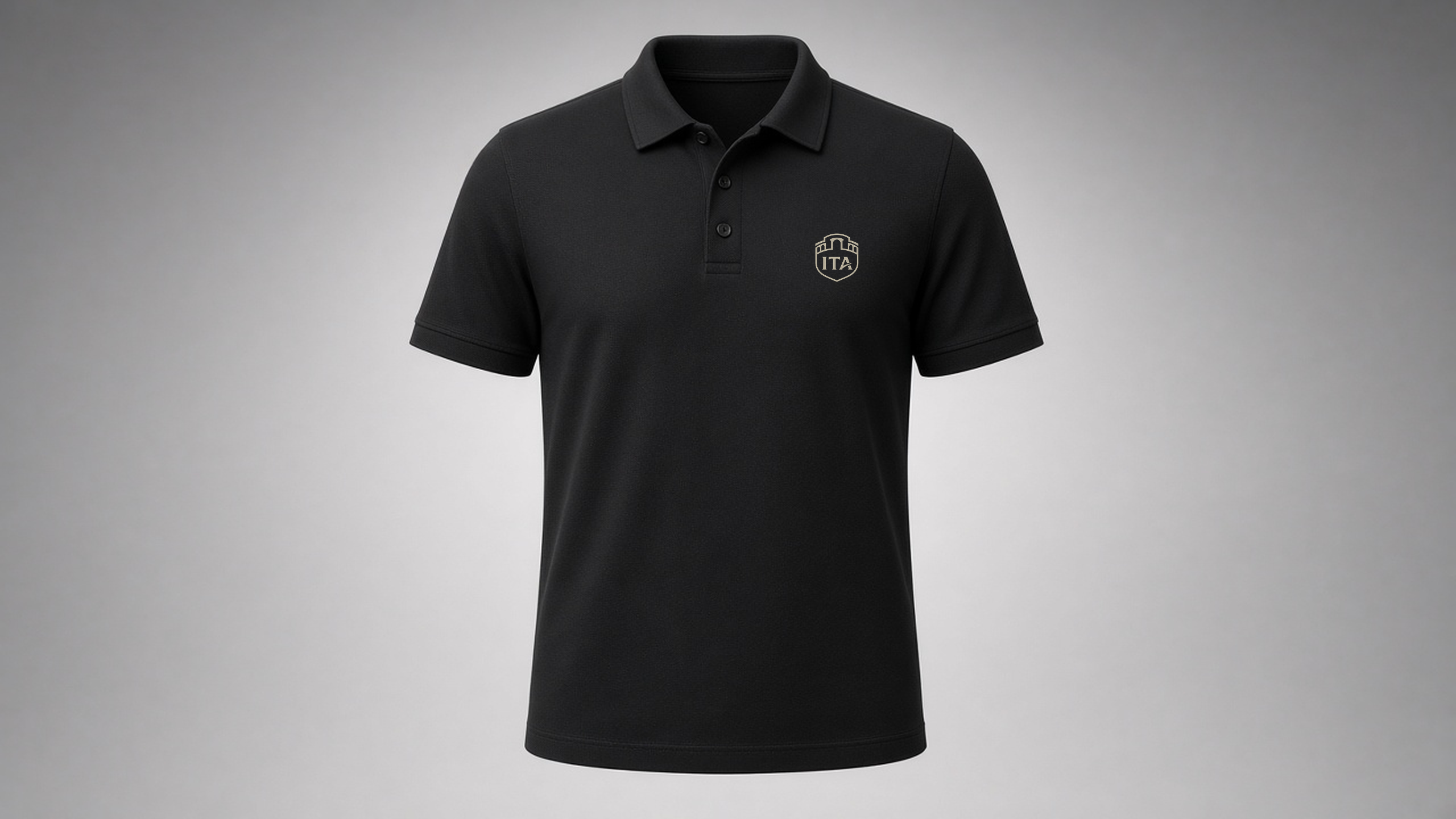 Crest Polo in black with small crest-mark on left chest
